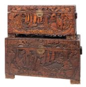 Two Chinese relief carved camphorwood trunks,
