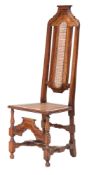 A William and Mary walnut and canework side chair,
