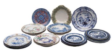 A group of blue and white transfer printed pearlware, ironstone and other pottery plates,