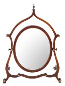 An Edwardian mahogany skeleton swing frame toilet mirror in the George III manner,