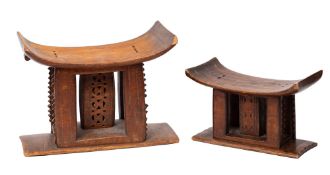 Two Ashanti carved hardwood stools, West Africa,