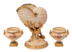 A Royal Worcester porcelain Nautilus vase under ivory and gilt decoration,
