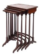 A set of early 19th Century rosewood and inlaid quartetto tables,