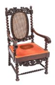 A Charles II walnut and canework elbow chair,
