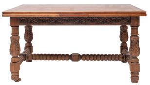 An oak and parquetry draw-leaf dining table, in 16th century taste,
