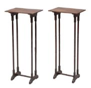 A pair of Regency mahogany vase or lamp stands,