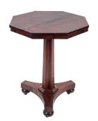 A Victorian rosewood octagonal occasional table with polygonal column and triform platform,