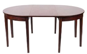 A George III mahogany extending dining table,