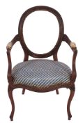 A carved mahogany and upholstered open armchair in Hepplewhite style,