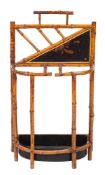 An Edwardian bamboo hall stand in Aesthetic Movement style,