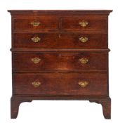 A George II oak two section chest of drawers,