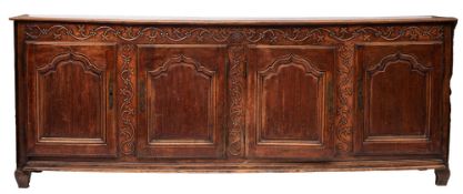 A Louis XV oak and walnut side cabinet or dresser,