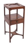 A George III mahogany square two-tier bedside washstand, the apertures with later cover,