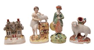 A group of Staffordshire pottery, comprising a Walton pearlware figure of an archer,