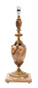 A polished alabaster and gilt metal mounted table lamp,
