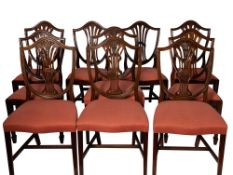 A composed set of ten mahogany and upholstered dining chairs in George III style,