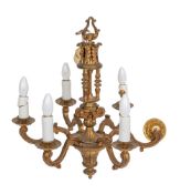 A gilt metal six-branch chandelier the central column with feather pediment and triple columns,