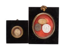A group of four plaster intaglio profiles,