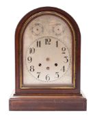 An Edwardian German mantel clock with movement and associated parts the eight-day duration movement