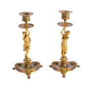 A pair of Louis XV style gilt bronze and champleve enamel candlesticks: with urn-shaped sconces