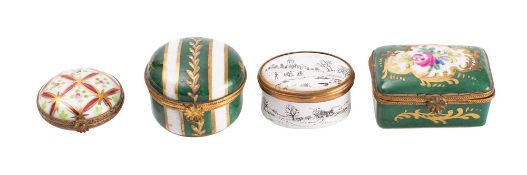 A Bilston enamel patch box, 20th Century; of oval form, decorated with Wintry landscapes,