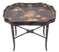 A Victorian papier mache tray on a later stand,