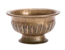 An Indo-Persian bronze alms bowl, of footed circular form,