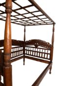 A South East Asian carved and stained wood day bed, in 17th century colonial style,