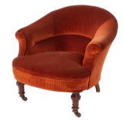 A Victorian brick red corduroy upholstered tub armchair,