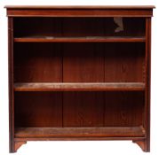 A Victorian mahogany open bookcase, late 19th century; the top with moulded edges,