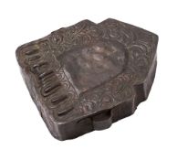 A Tibetan Buddhist portable metal shrine [Gau] of arched form with foliate repousse decoration,