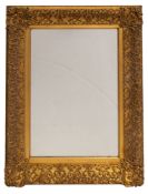 A Victorian gilt composition framed rectangular wall mirror, in Louis XIV style,