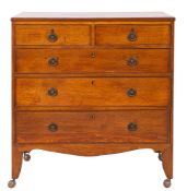 A George III oak chest of drawers,