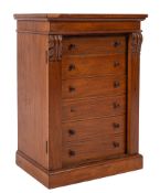 An Edwardian mahogany table top Wellington chest, the rectangular top above six drawers,