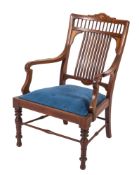 An Edwardian mahogany and marquetry open elbow chair,