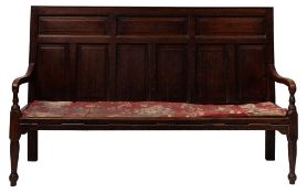 A George II or early George III oak settle,