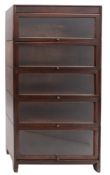 A North American oak and glazed stacking bookcase by Gunn of Grand Rapids,