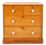 A Victorian Heals pine rectangular chest with a moulded top containing two short and two long
