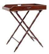 A late George III mahogany butler's tray on stand, early 19th century; rectangular,