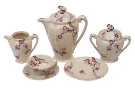 A Limoges porcelain coffee service, comprising a coffee pot and cover, sucrier and cover,