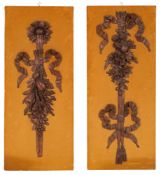 Two similar carved and stained oak wall reliefs,