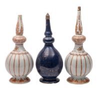 A pair of Chinese rouge-de-fer rose water sprinklers and a powder blue sprinkler all of baluster