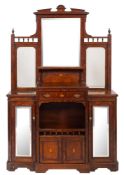 A Victorian walnut side cabinet, the stepped mirror back set on a base with raised centre,