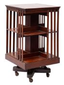 A Victorian mahogany revolving bookcase, late 19th century; of square section,