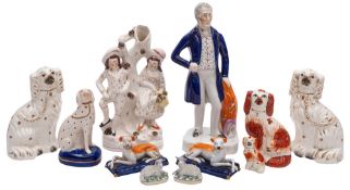 A mixed group of Staffordshire figures comprising a portrait figure of the Duke of Wellington,