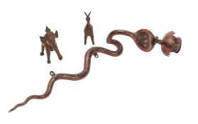 An Indian Kashmiri enamelled and engraved brass wall-mounted snake candlestick in the form of a