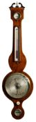 A mahogany wheel barometer having an eight-inch round silvered dial with usual barometer markings,