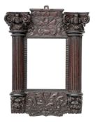 A carved and stained wood framed wall mirror in 17th century Baroque taste,