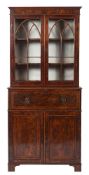 A George IV yew-wood veneered and crossbanded secretaire bookcase,