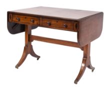 A Regency mahogany and inlaid sofa table, bordered with boxwood and ebony lines,